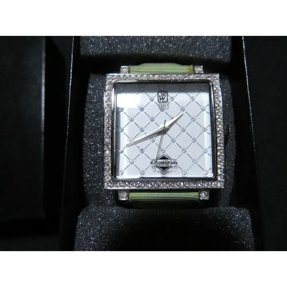 Victoria Weick of Beverly Hills Womens Wrist Watch Green Band Silver Case